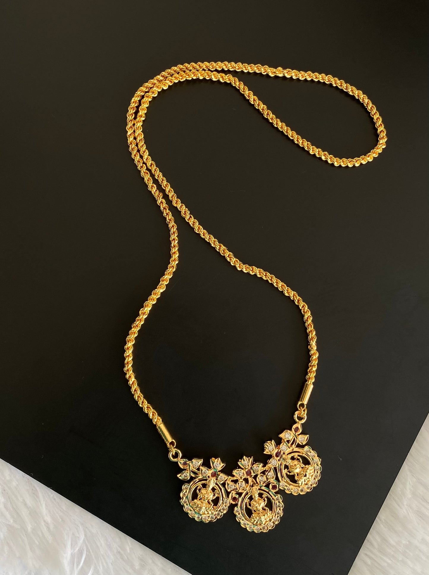 Gold tone ruby-white stone lakshmi pendant with chain dj-53252