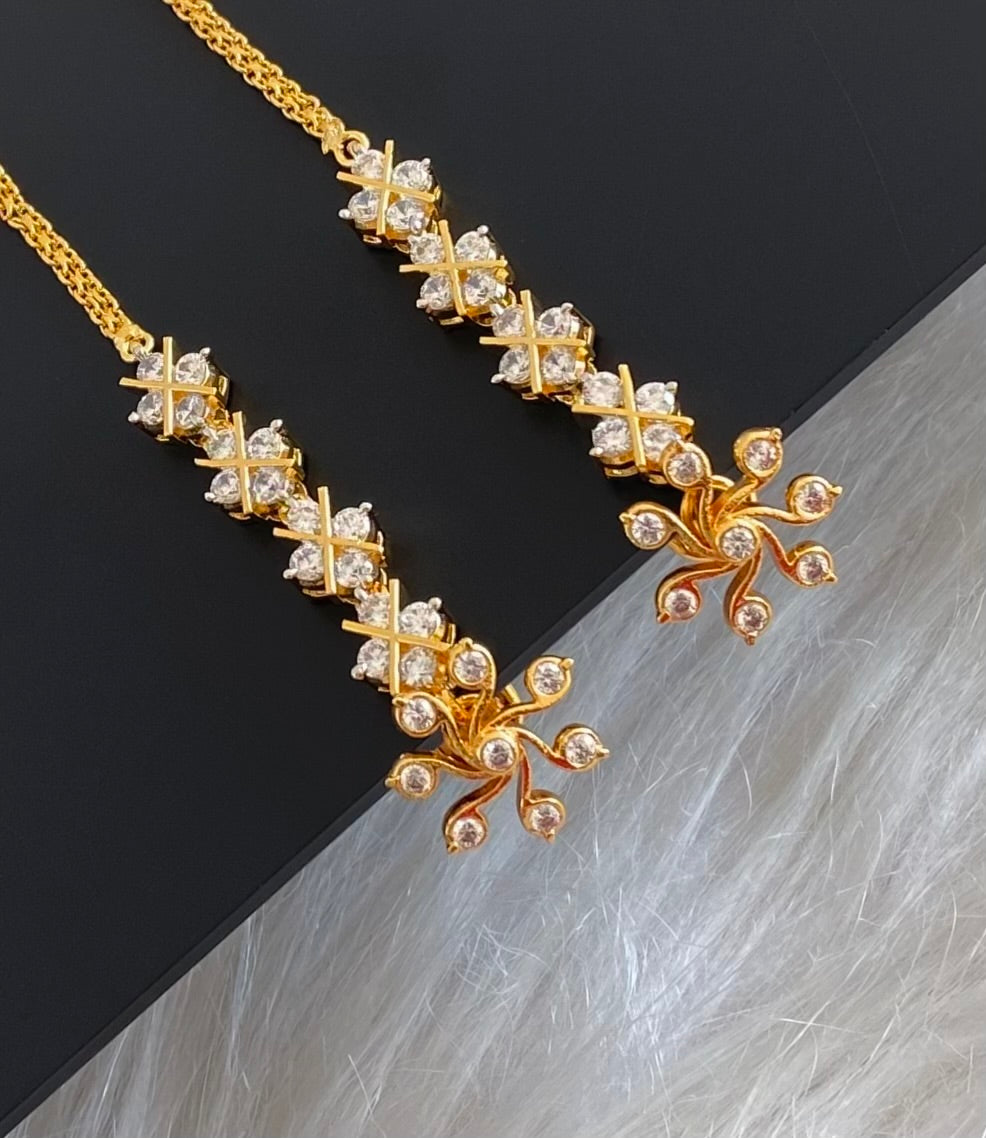 Gold tone white stone earrings with ear side chain dj-55059