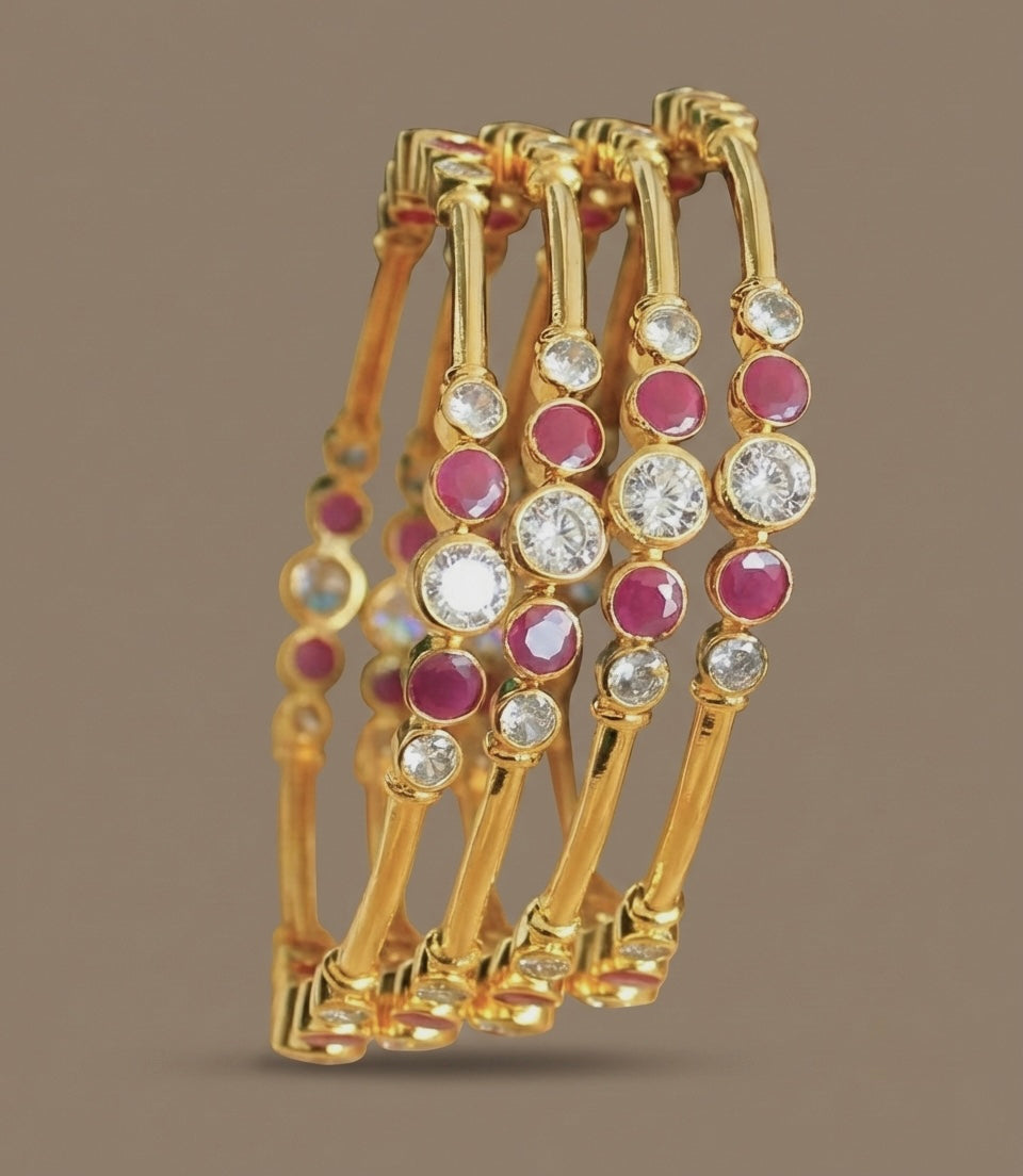 Gold Tone Cz Ruby Set Of 4 Bangles(2.6) DJ27662