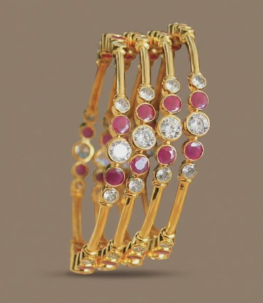 Gold Tone Cz Ruby Set Of 4 Bangles(2.4) DJ27661