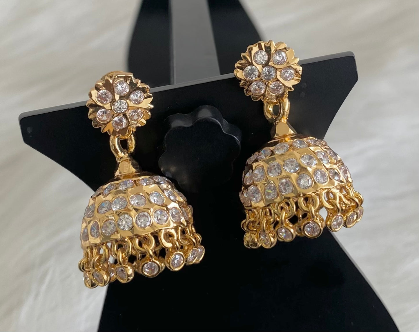 Gold tone south indian style AD white jhumkka dj-53864