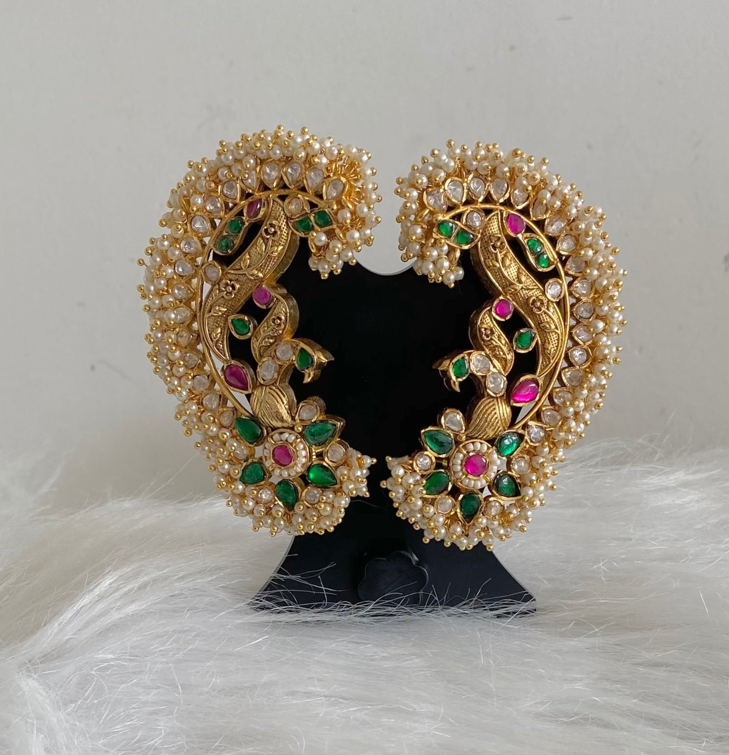 Gold tone green-pink-white kundan jadau big peacock khanpool earrings dj-54573
