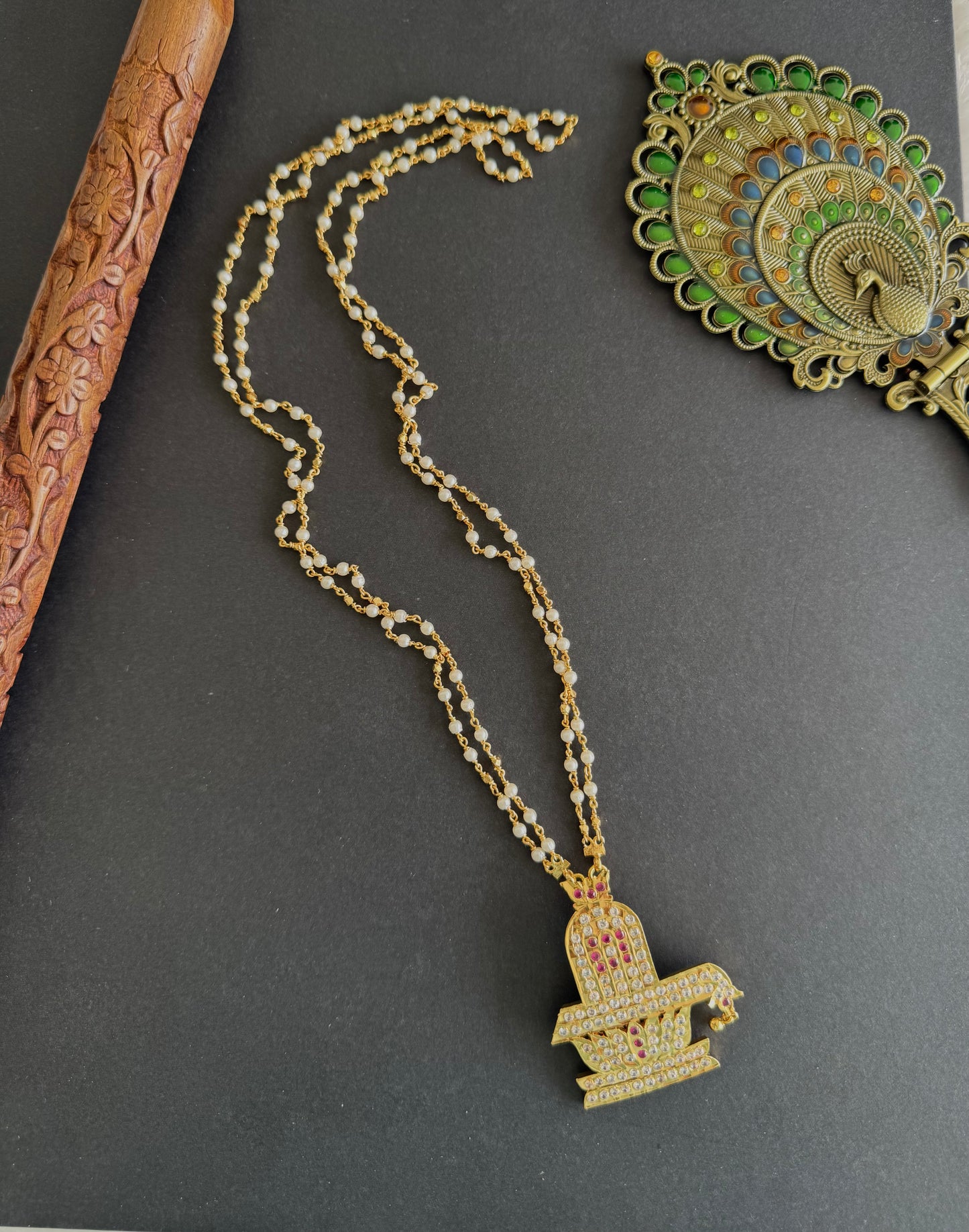 Gold tone 24 inches chain with AD shiva lingam pendant dj-52225