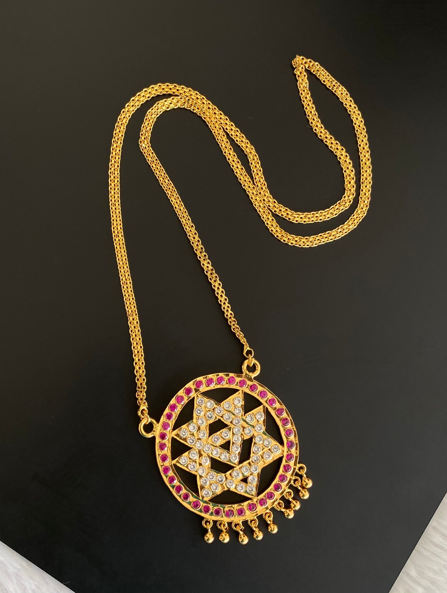 Gold tone 24 inches chain with AD pink-white chakram pendant dj-53263