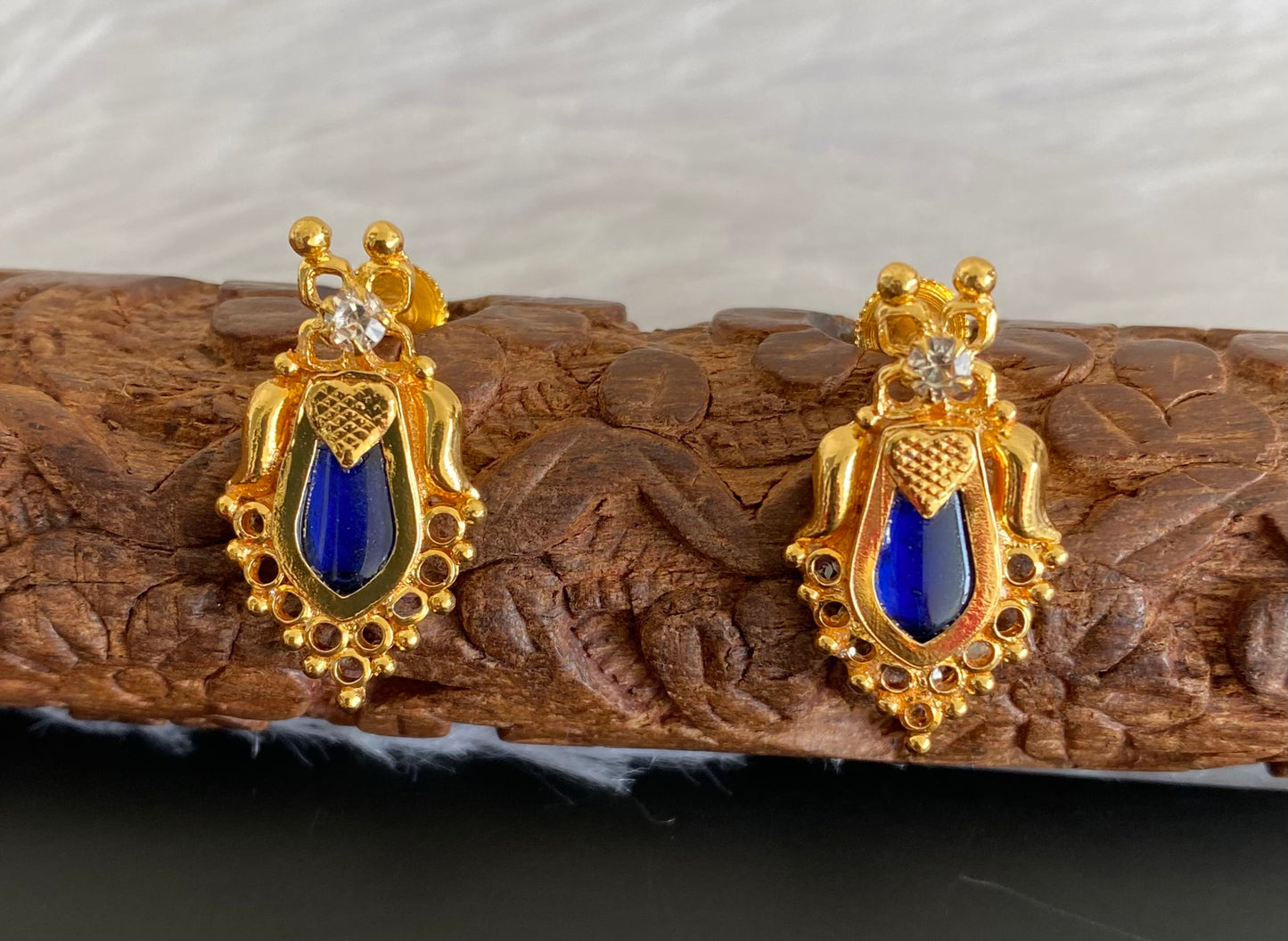 Gold tone blue-white stone nagapadam kerala style stud/earrings dj-53118