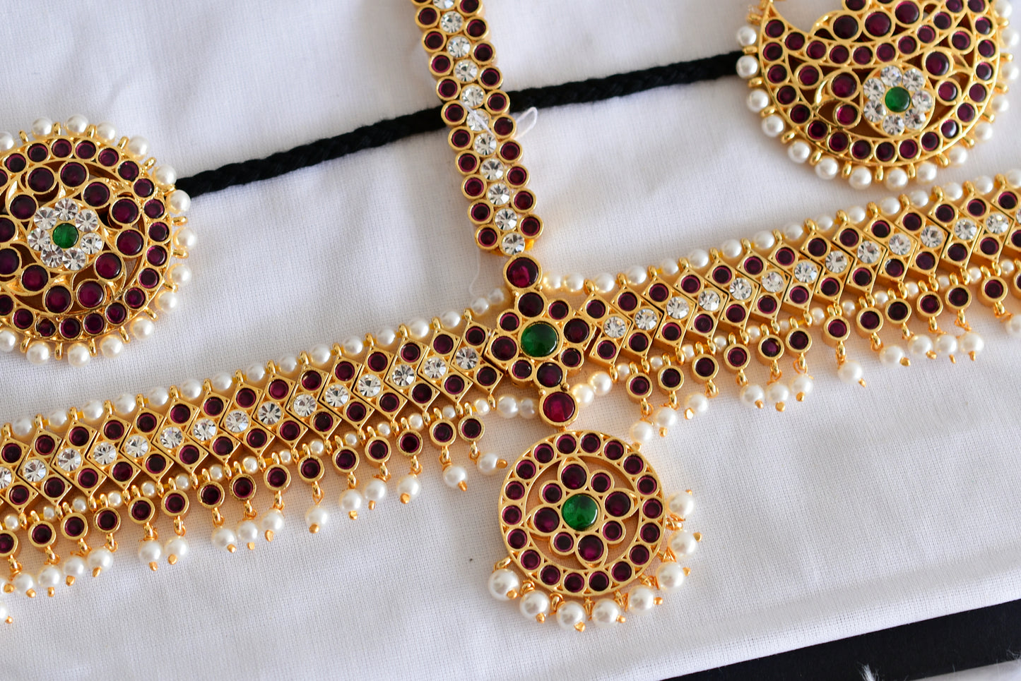 Gold tone precious kemp-green-white pearl maang head set with sun moon dj-52268