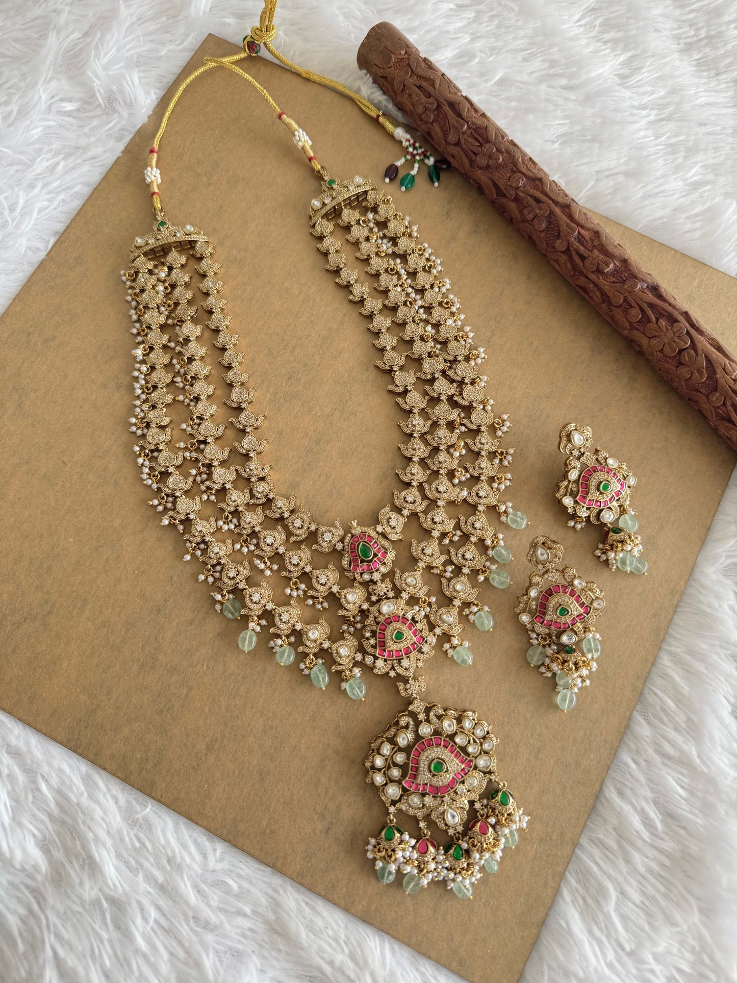 Antique gold tone cz pink-green kundan layer haar set dj-51559