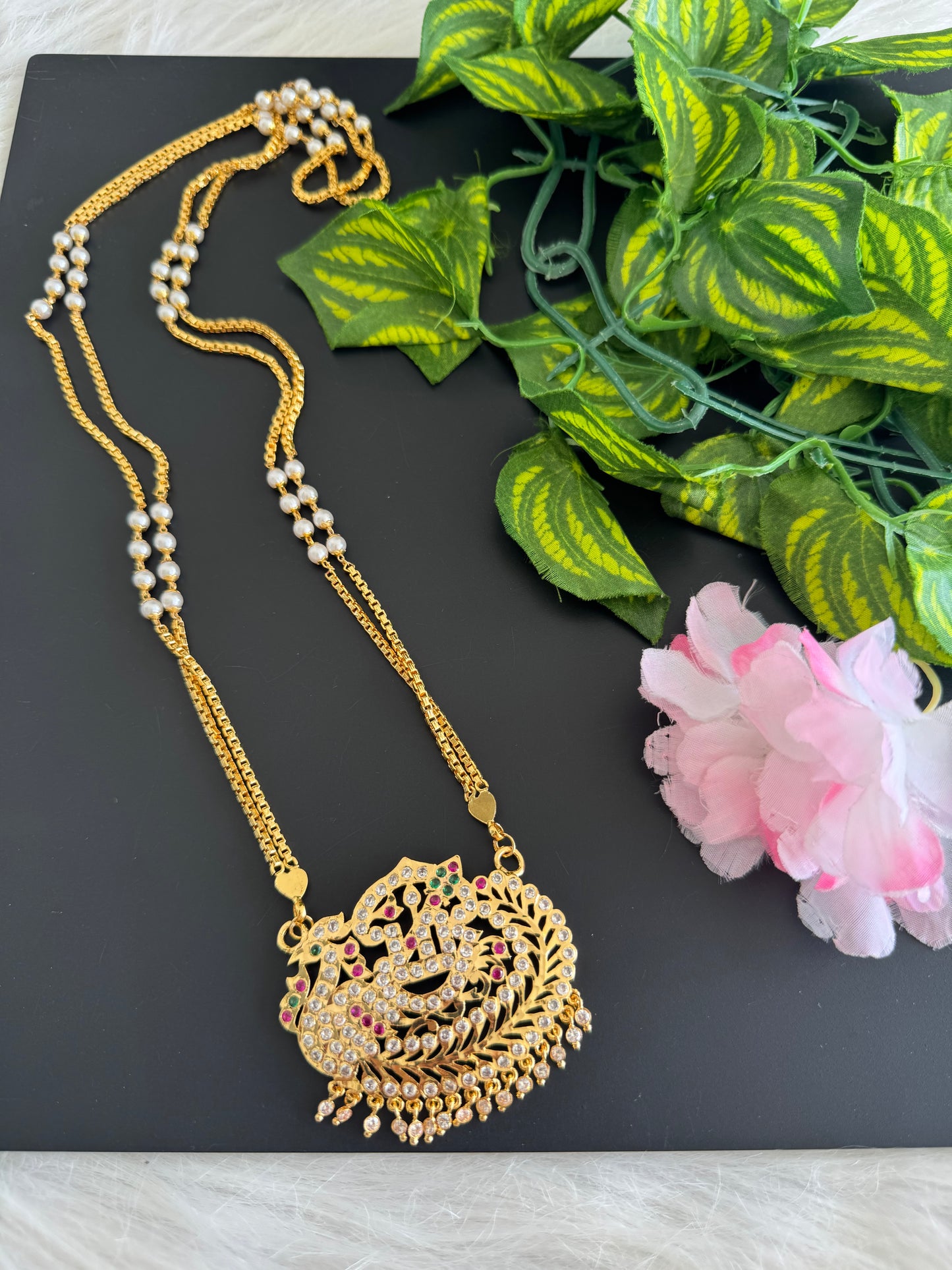 Gold tone double layer pearl chain with AD pink-green Om peacock pendant dj-51191