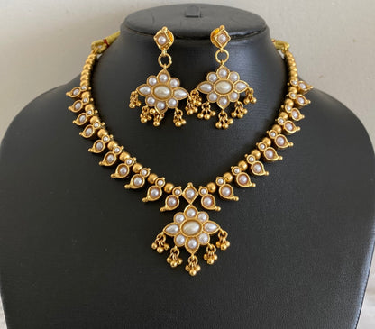 Antique gold tone coral-pearl stone reversible mango necklace set dj-54085