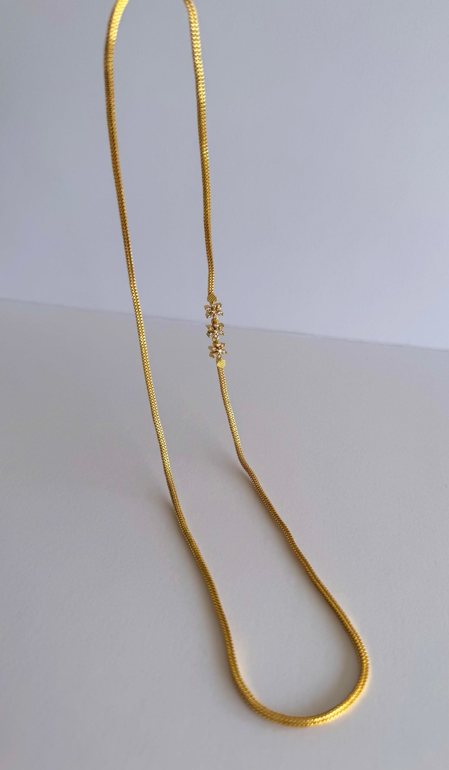 Gold tone cz white Nakshatra mugappu 24 inches chain dj-42823