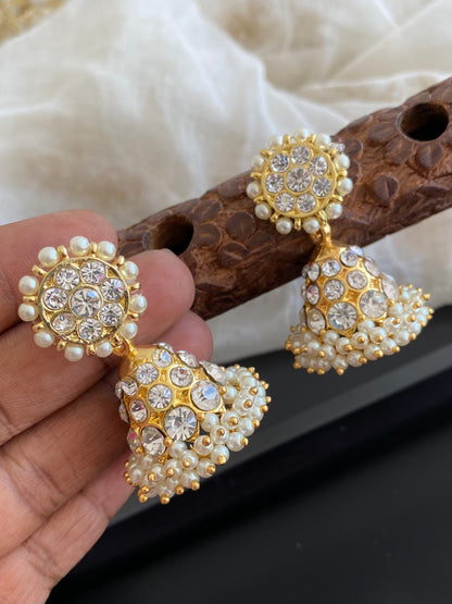 Gold tone precious white stone pearl jhumkka dj-53907