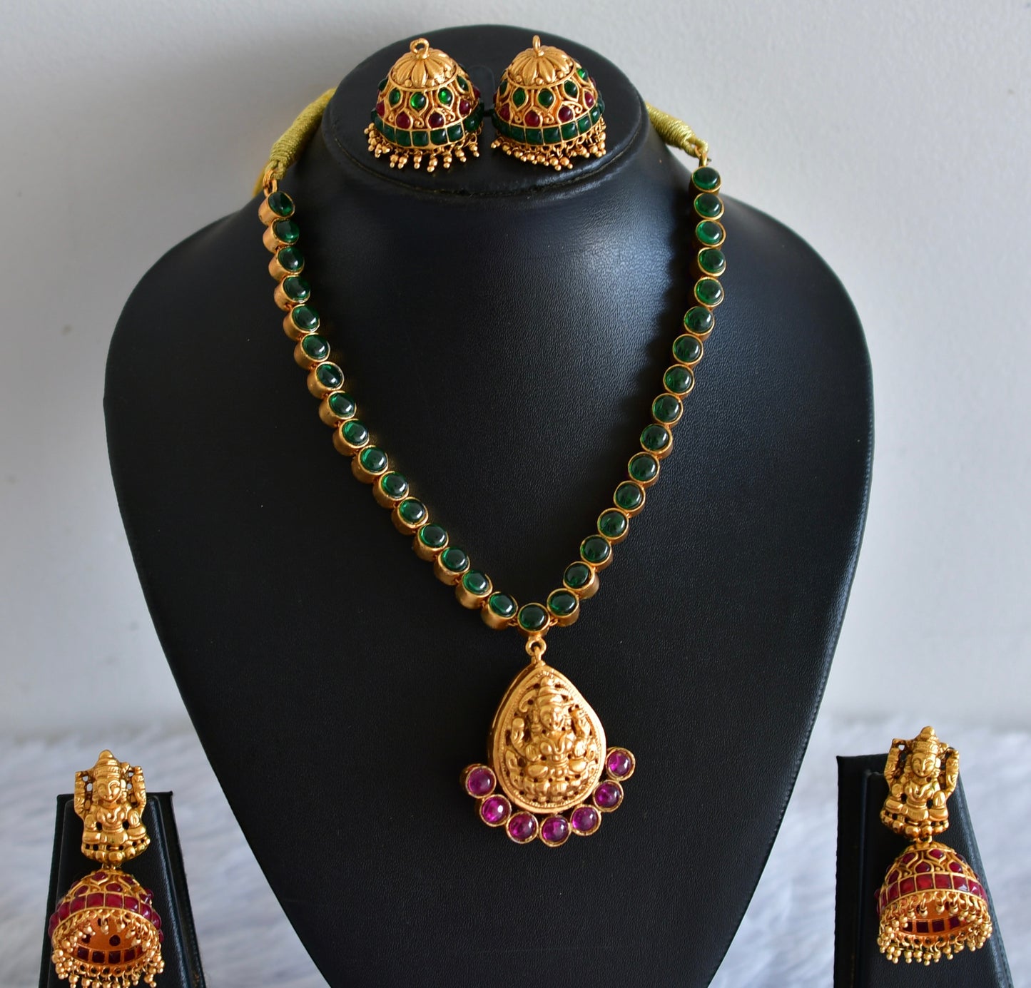 Matte finish kemp-green reversible Lakshmi necklace set dj-52412