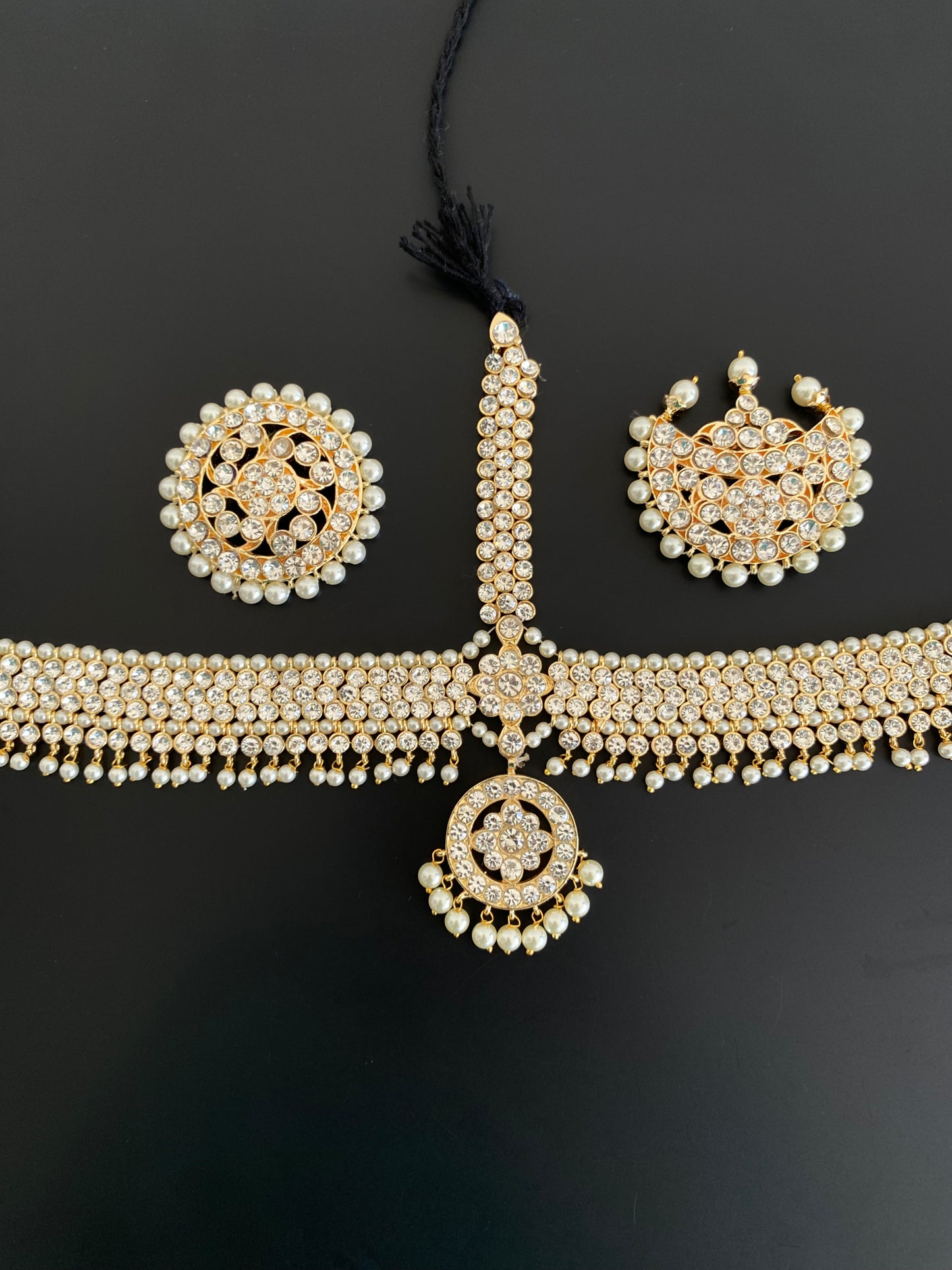 Gold tone AD white stone pearl with sun moon set tikka dj-53385