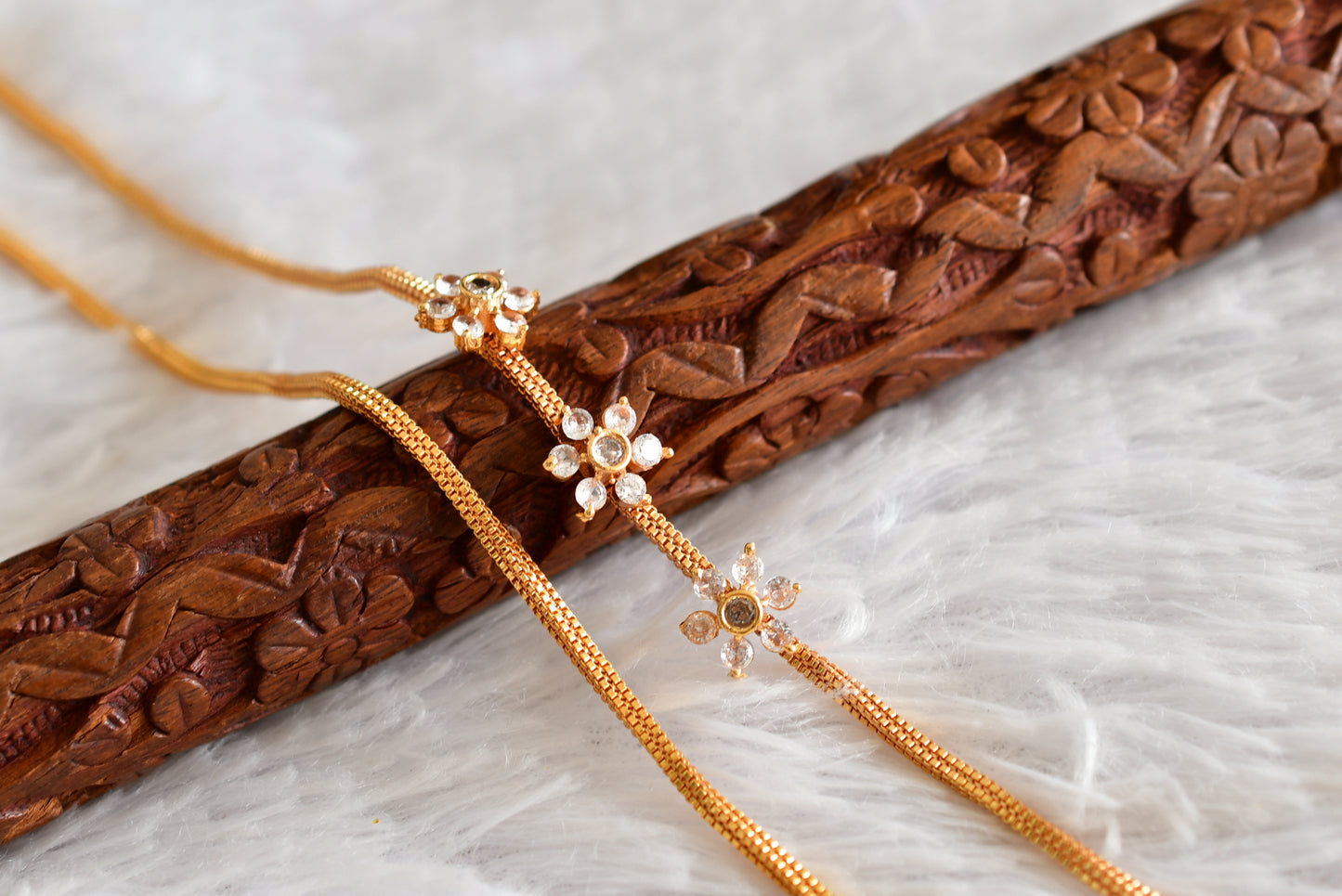 Gold tone white stone flower mugappu chain dj-51899