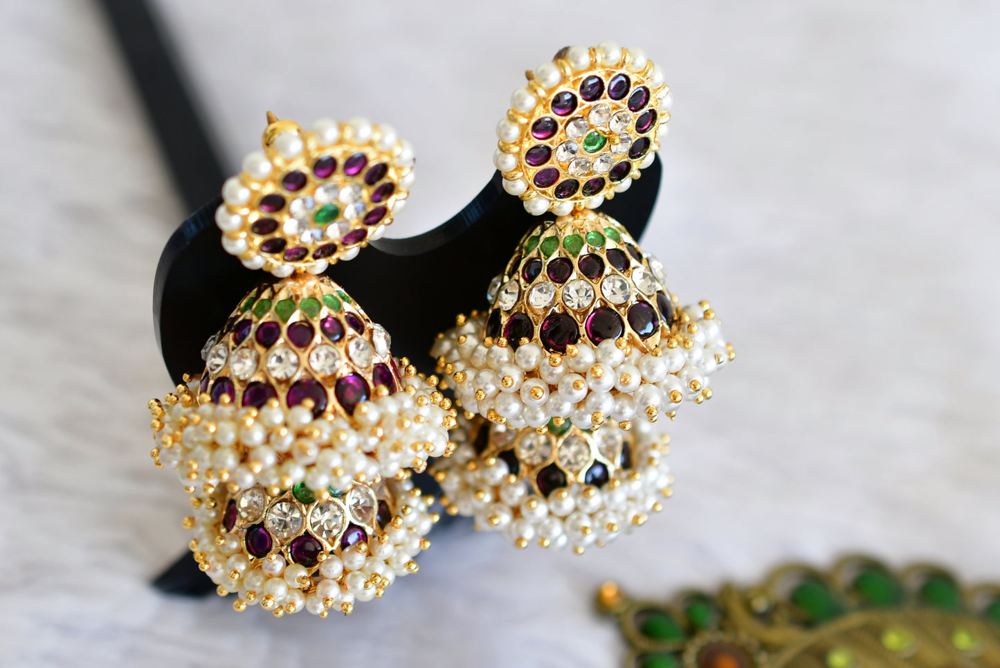 Gold tone precious kemp-green-white stone pearl big step jhumkka dj-52519