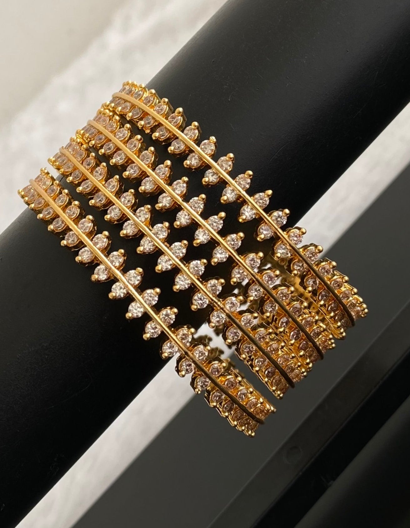 Gold tone white stone set of 4 bangles(2.4) dj-53428
