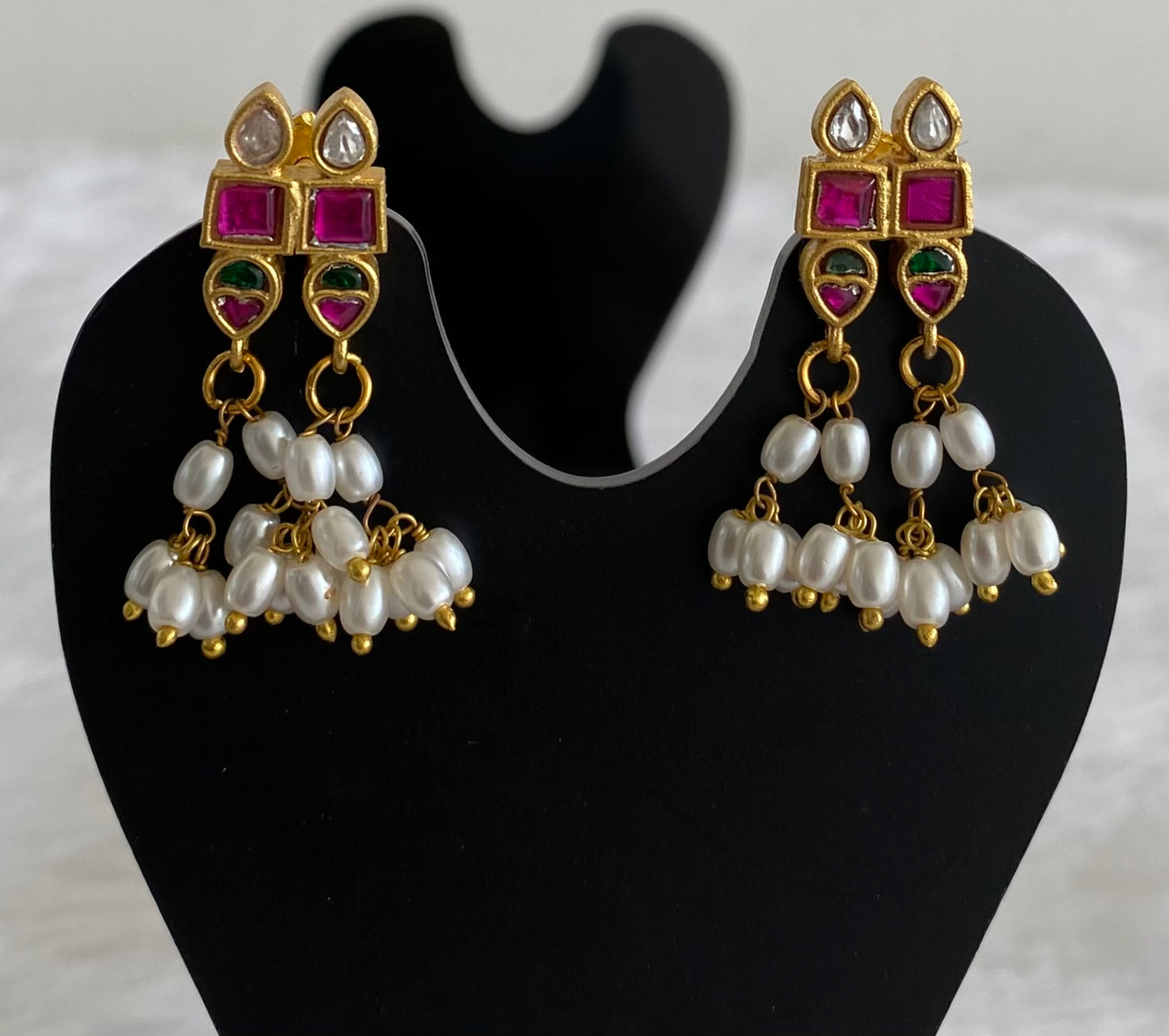Gold tone pink-green-white stone pearl kundan jadau earrings dj-53559