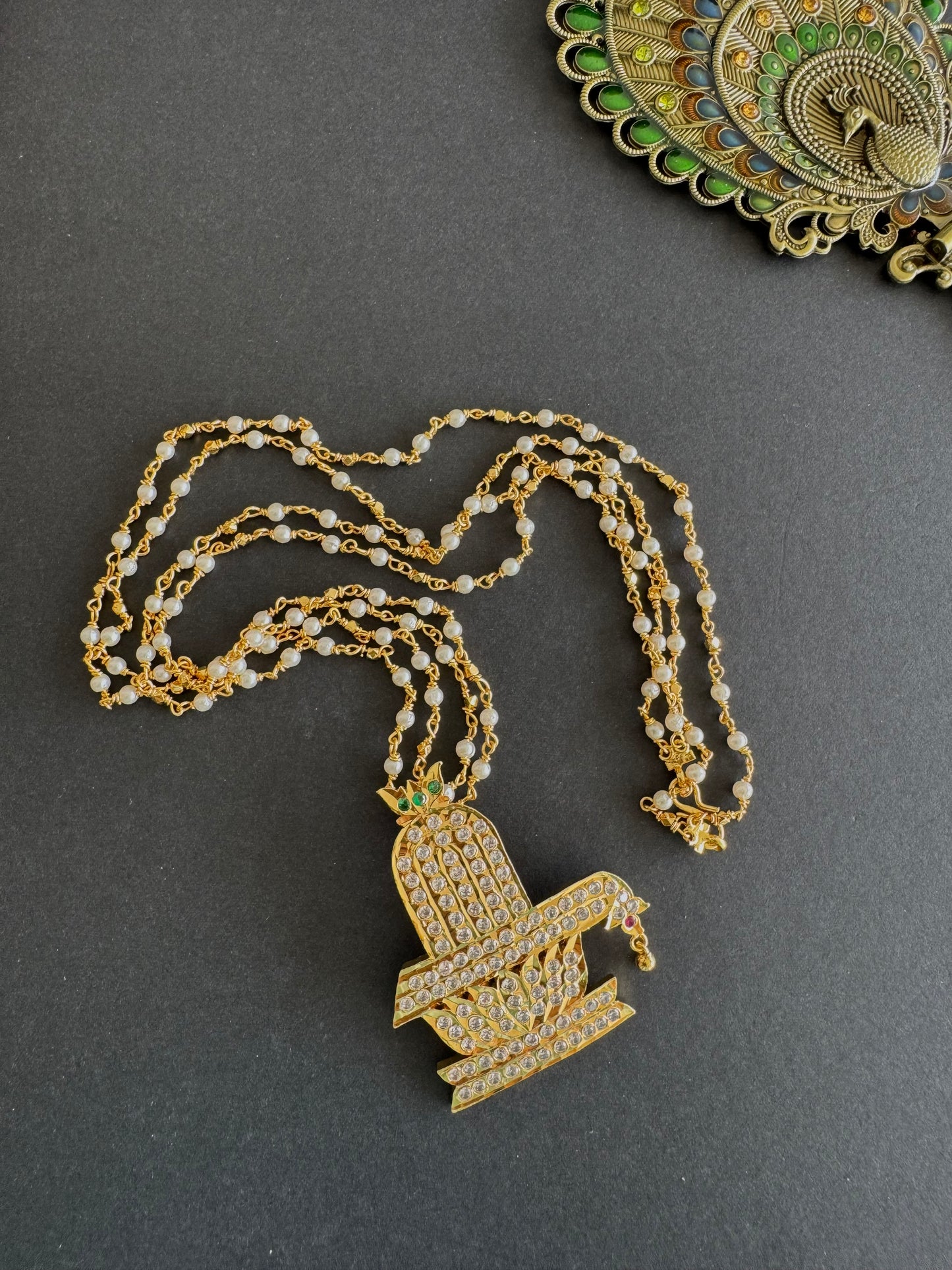 Gold tone 24 inches chain with AD shiva lingam pendant dj-52224