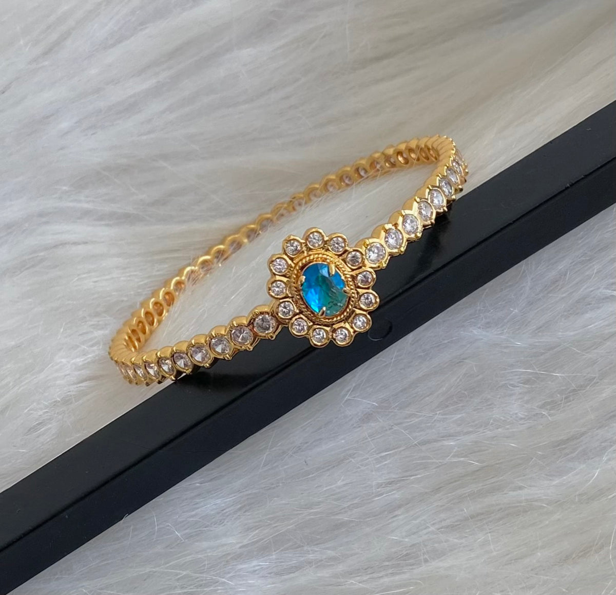 Gold tone AD white blue stone diamond look alike bangle/kada(2.10) Dj-54870