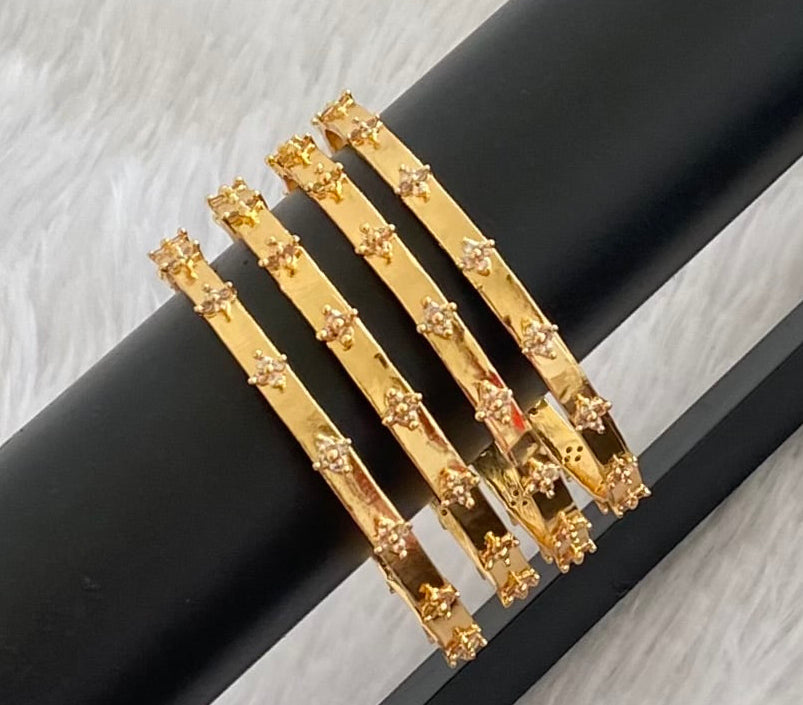 Gold tone white stone set of 4 bangles (2.4) dj-53502