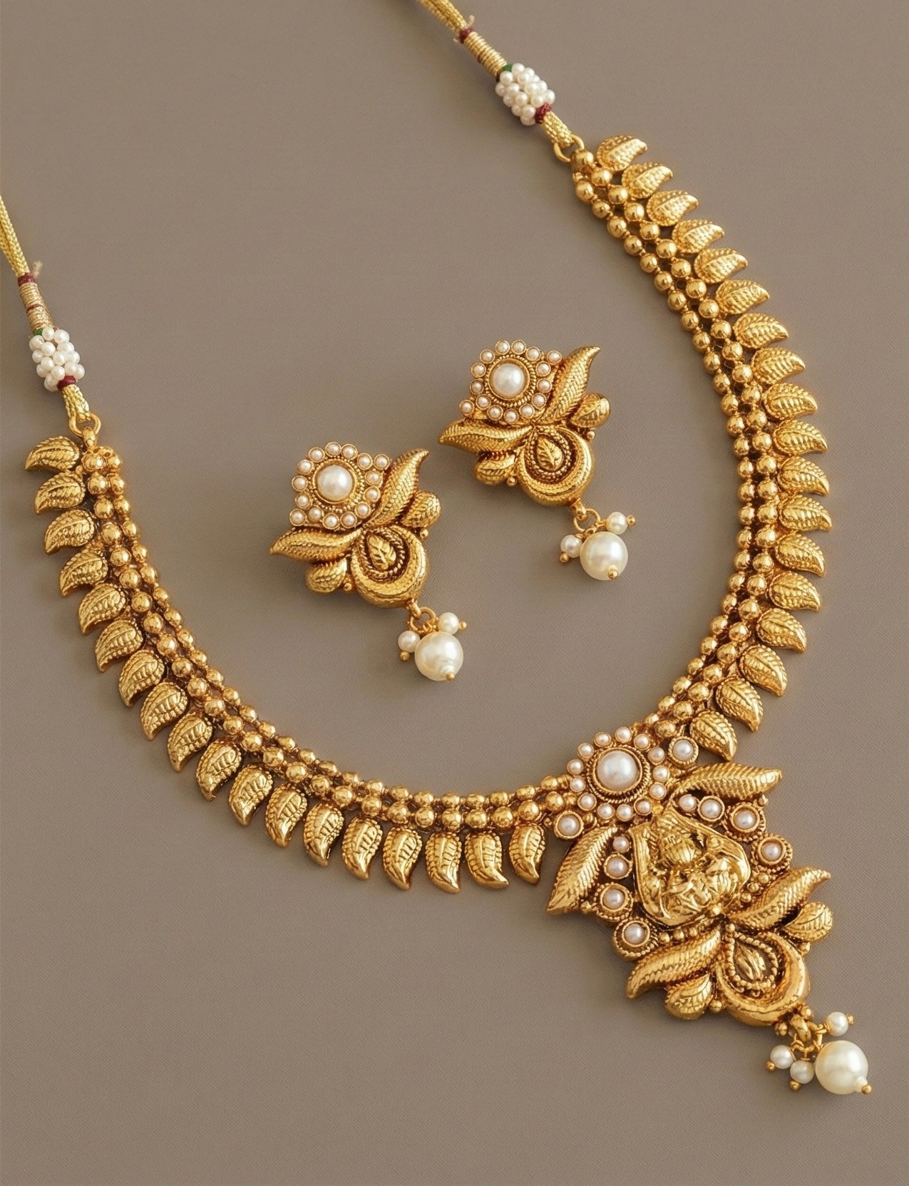 Antique gold tone pearl lakshmi necklace set-dj07498