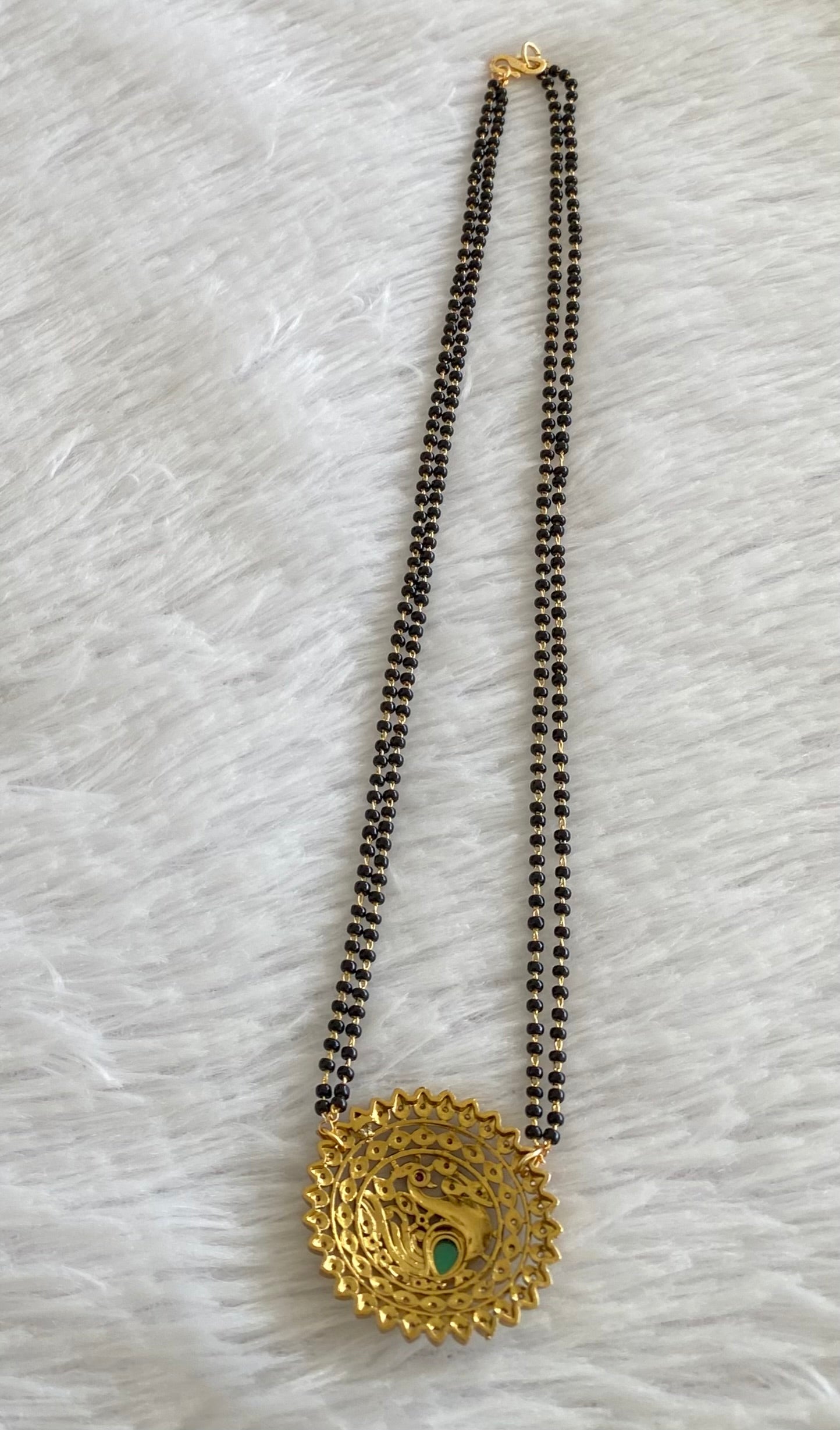 Gold tone 18 inches karimani chain with peacock round pendant dj-53610