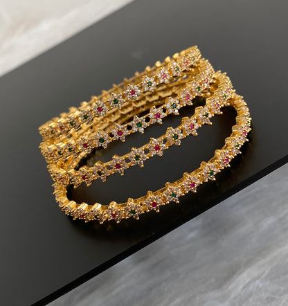 Gold tone cz-ruby-green set of 4 nakshatra bangles(2.10) dj-55151