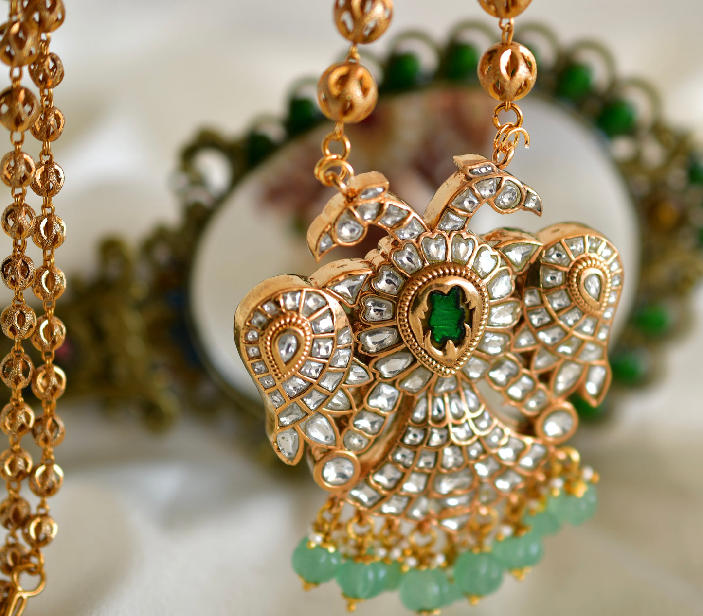 Gold tone pink-green kundan jadau Gandaberunda reversible necklace dj-52597