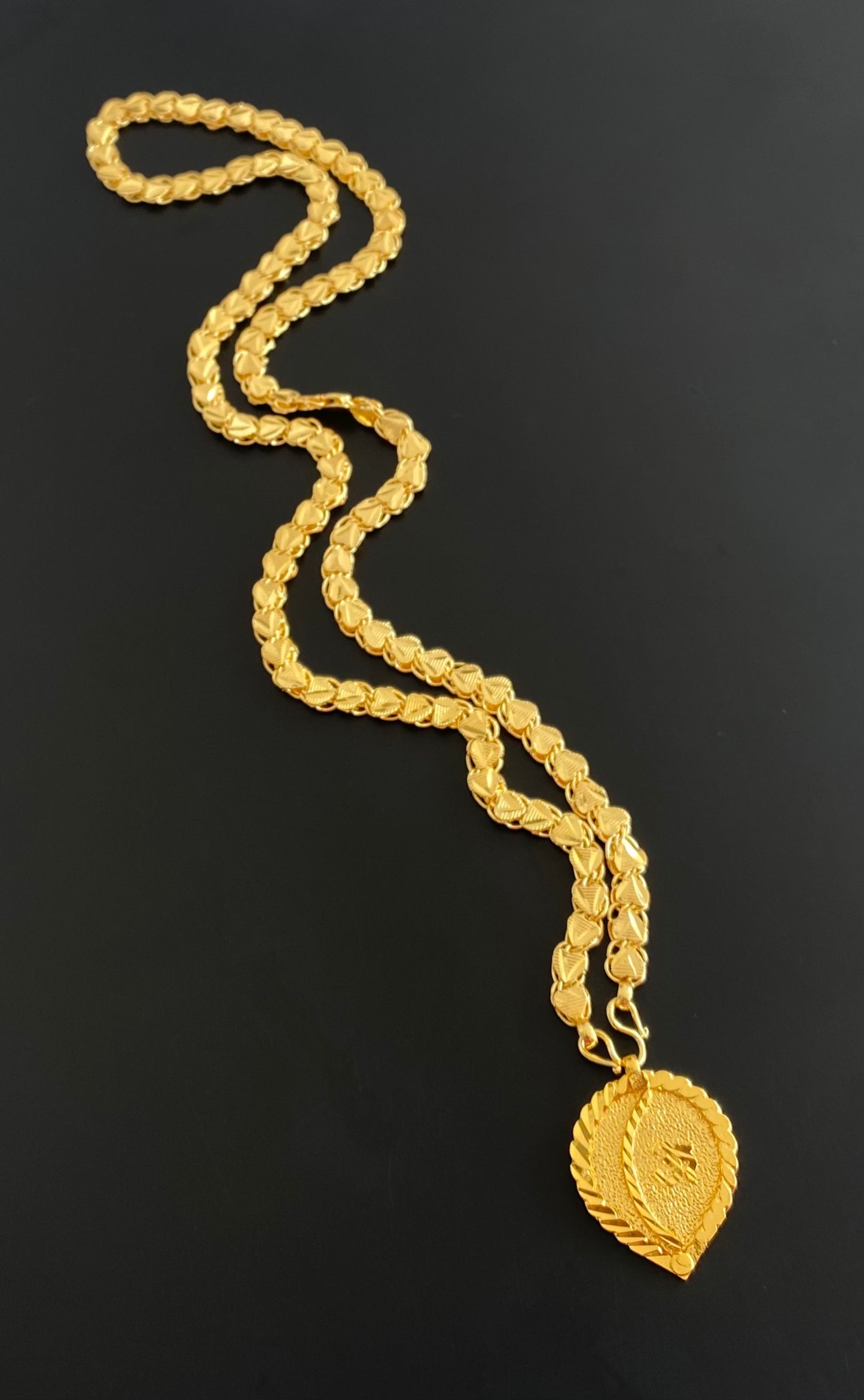 Gold tone 24 inches heart chain with om pendant dj-54383