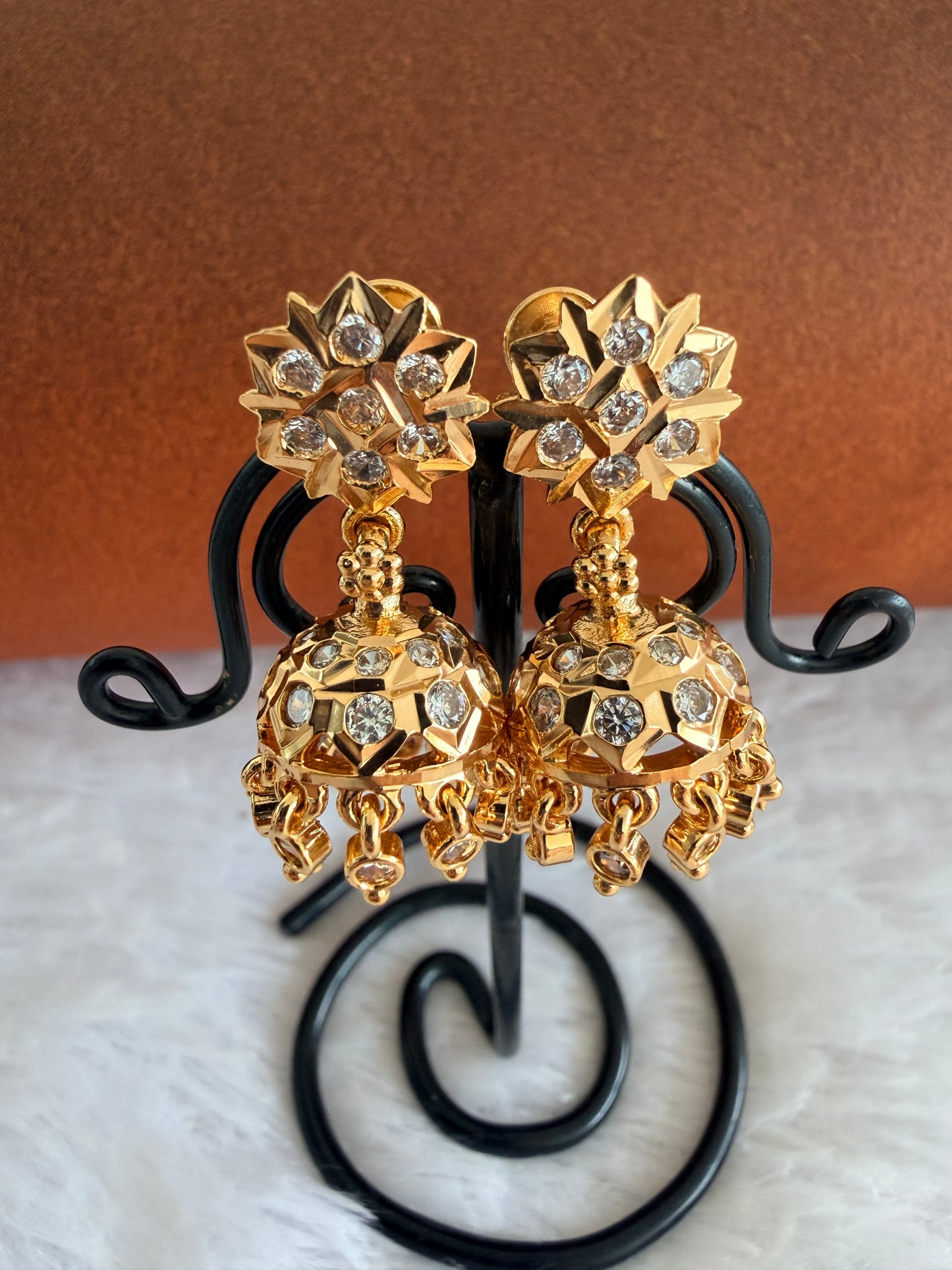 Gold tone AD white south Indian flower jhumkka dj-53271