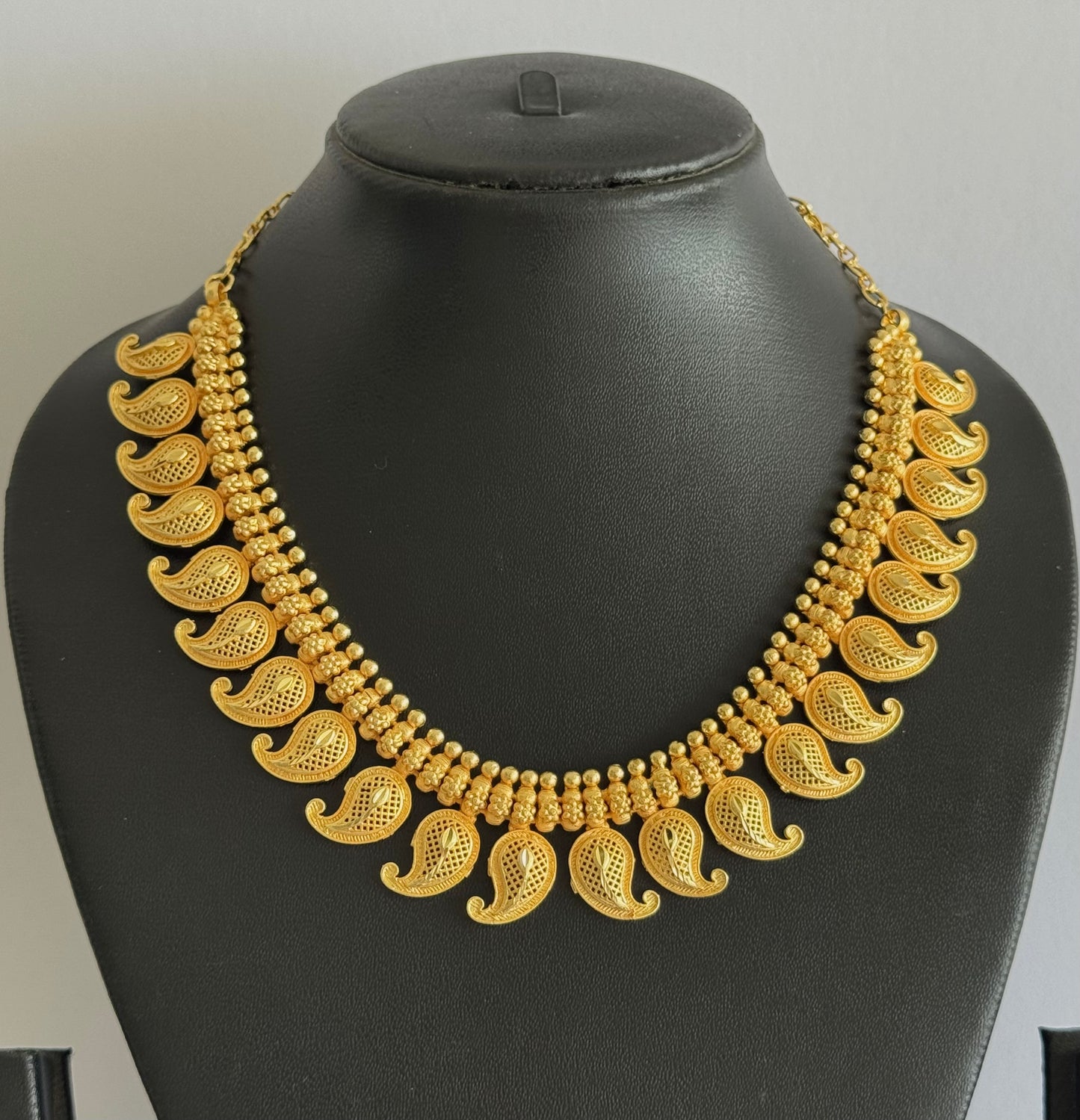 Matte gold tone kerala style mango necklace dj-51658