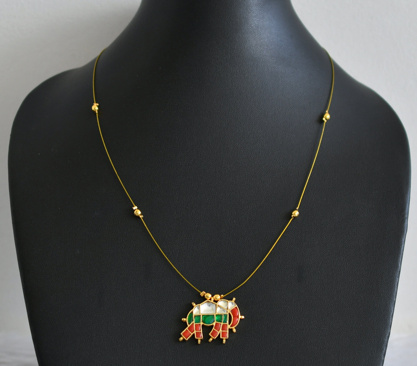 Gold tone coral-green-white kundan jadau elephant invisible necklace dj-48706