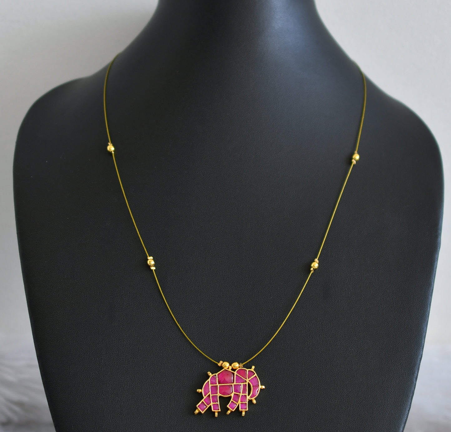 Gold tone pink kundan jadau elephant invisible necklace dj-48702