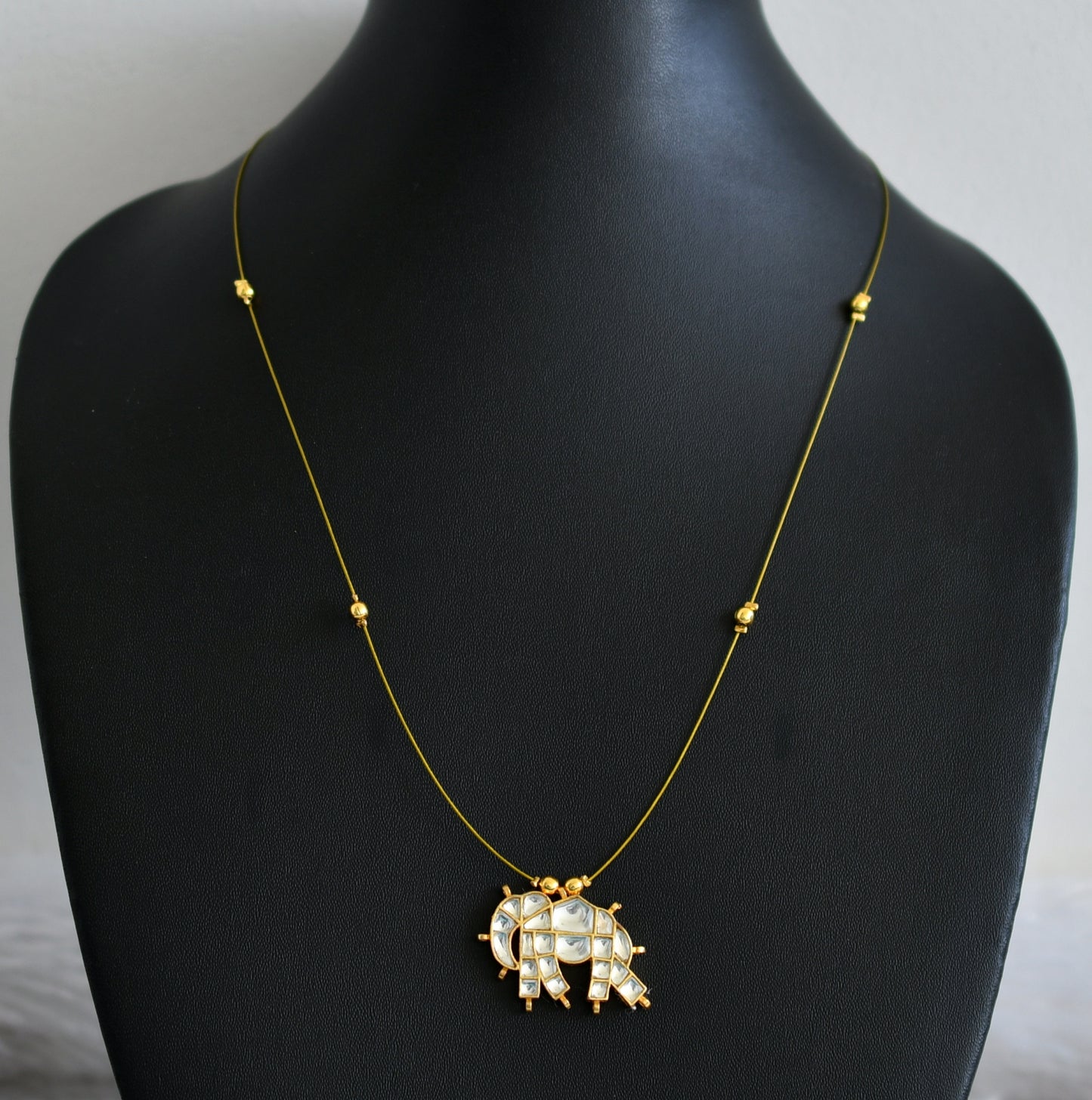 Gold tone white kundan jadau elephant invisible necklace dj-48694