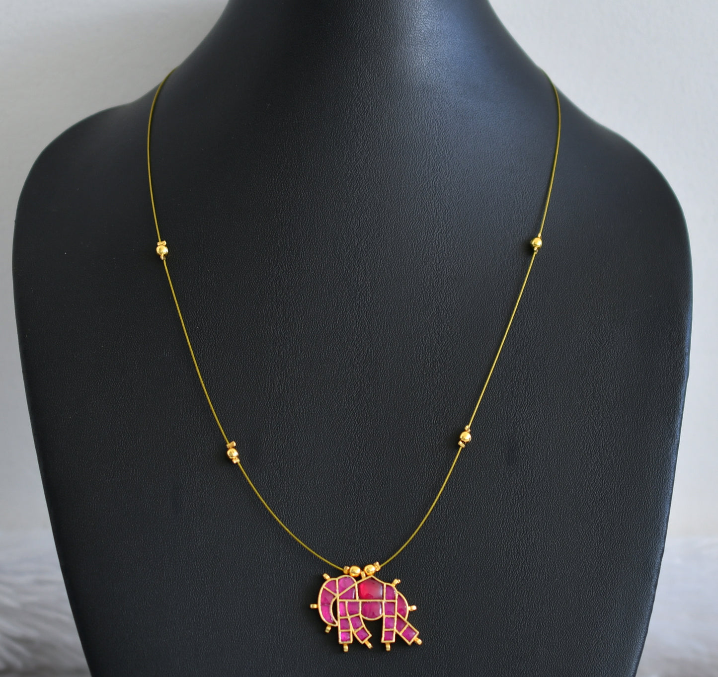 Gold tone pink kundan jadau elephant invisible necklace dj-48700