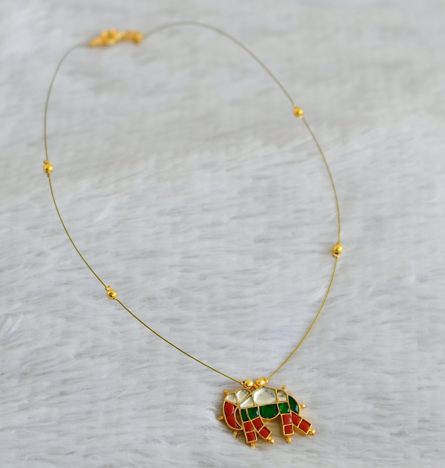 Gold tone coral-green-white kundan jadau elephant invisible necklace dj-48701