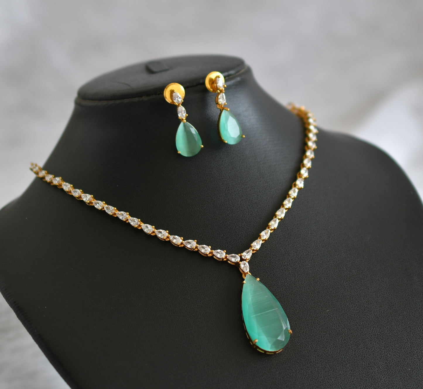 Matte finish cz sea green thilak stone necklace set dj-47010