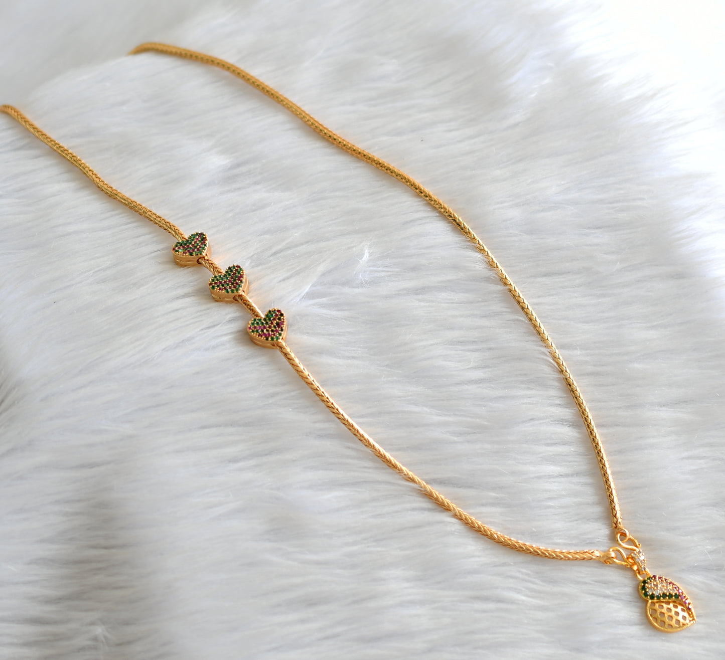 Gold tone 24 inches ruby-green heart mugappu chain with ruby-green-white pendant dj-43642