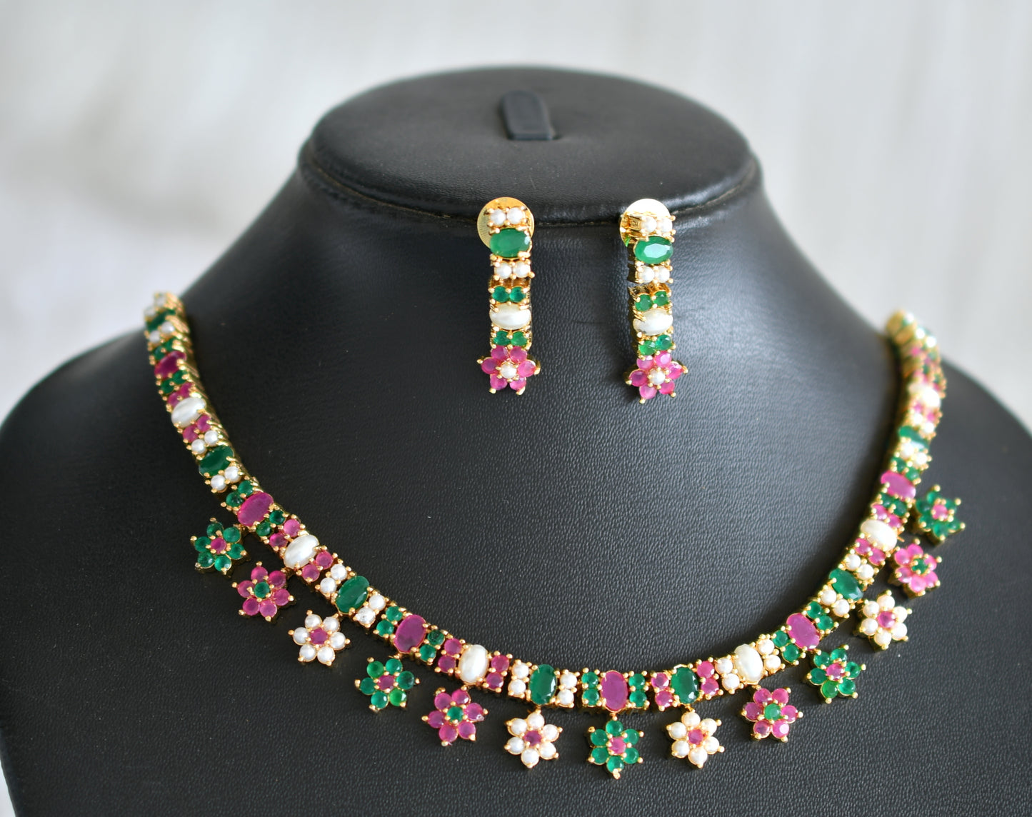 Gold tone ruby-green-pearl stone flower necklace set dj-43719