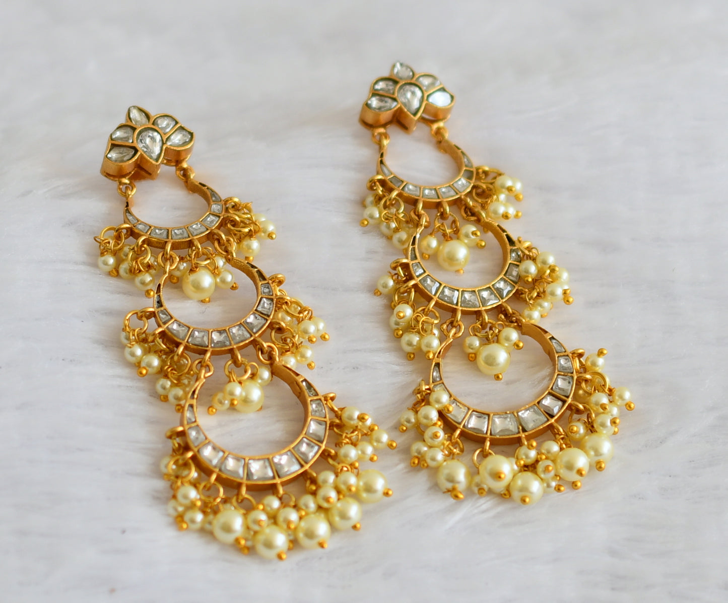 Gold tone white kundan jadau step earrings dj-50721