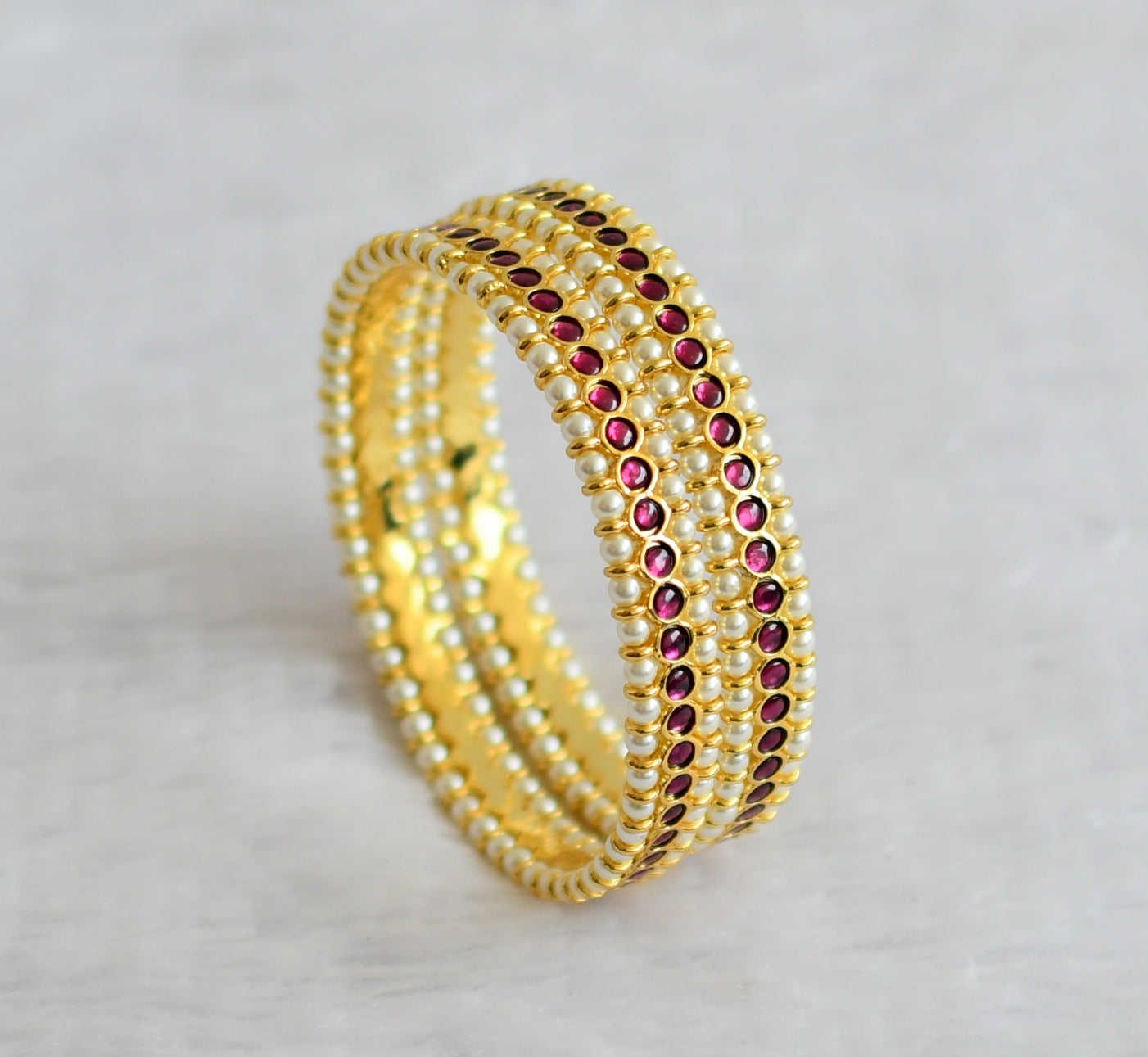Gold tone precious kemp pearl bangles(2.10) dj-50785