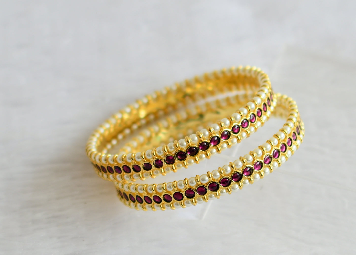 Gold tone precious kemp pearl bangles(2.10) dj-50785