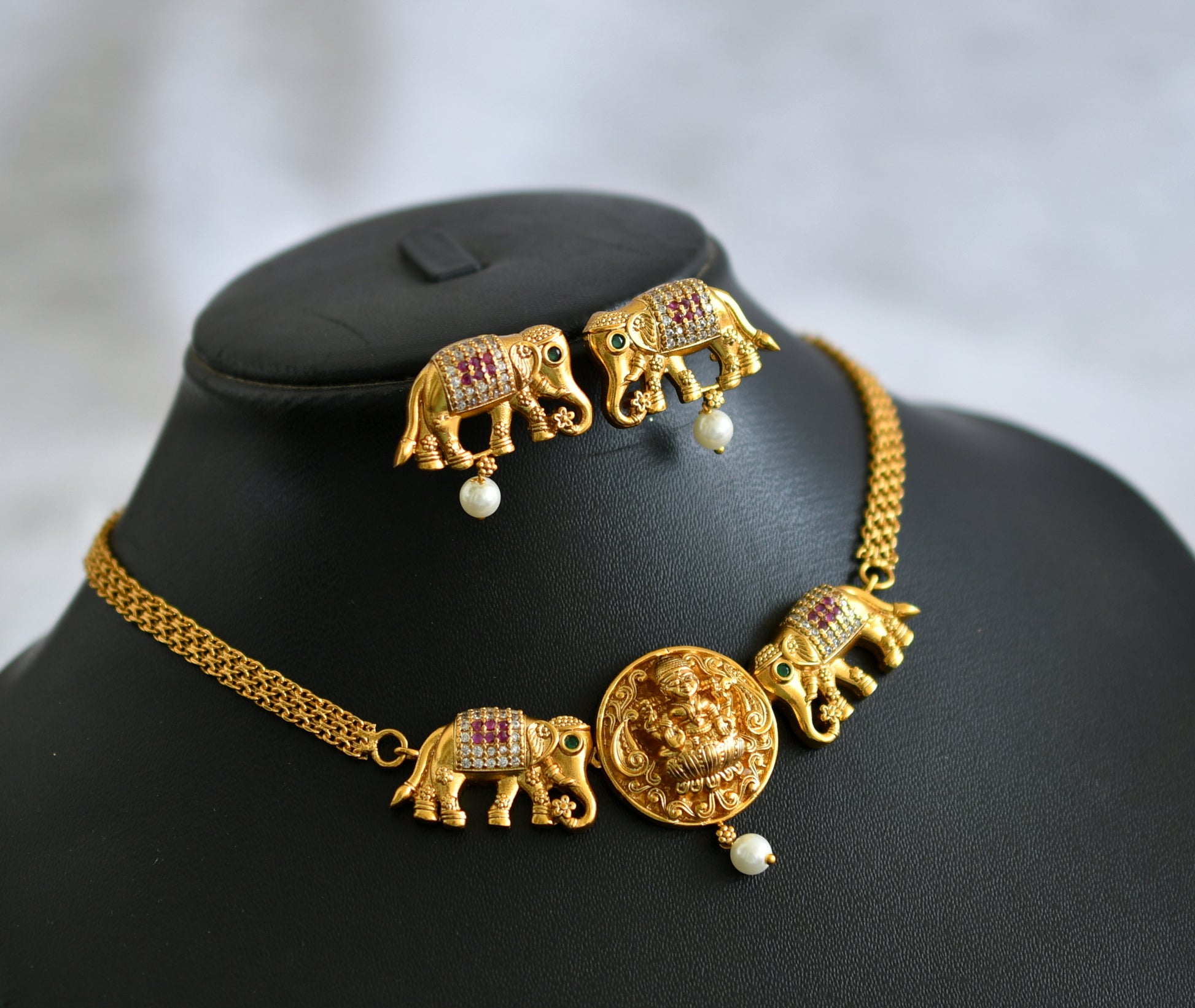 Matte finish ruby-green-white lakshmi-elephant choker necklace set