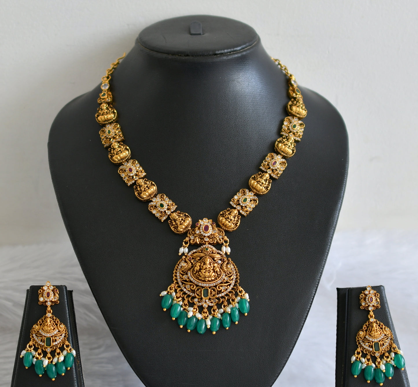 Antique gold tone ruby-green-white lakshmi green bead necklace set dj-50843
