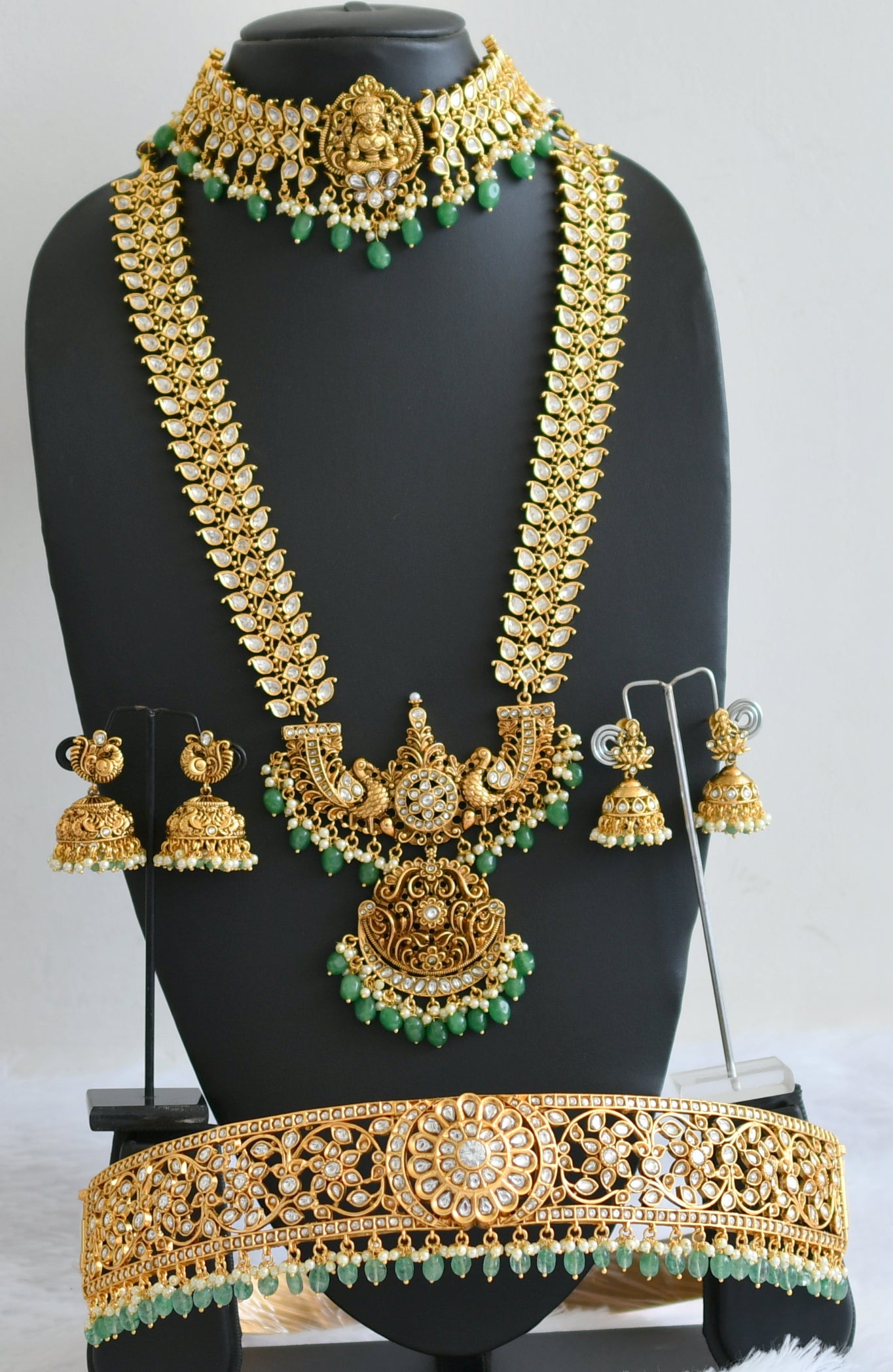 Matte finish white lakshmi-peacock-maango green beaded bridal set dj-50877