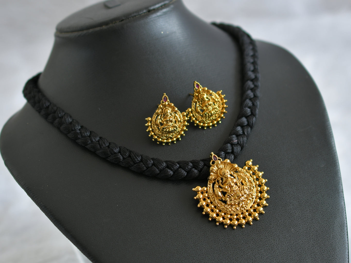 Matte finish black silk thread kemp stone lakshmi necklace set dj-47100