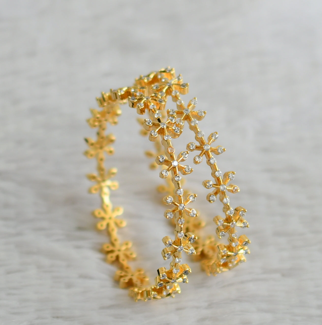 Gold tone cz white stone flower bangles(2.8) dj-48901