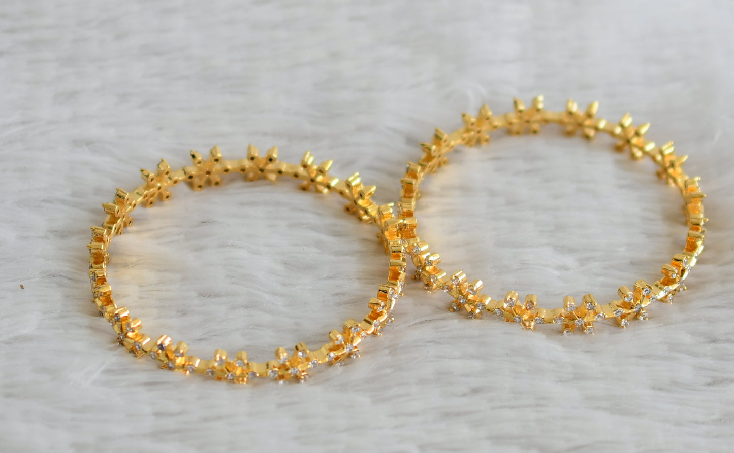 Gold tone cz white stone flower bangles(2.4) dj-48899