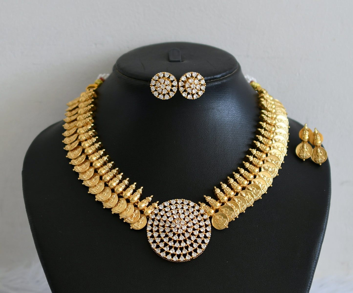 Matte finish white stone lakshmi coin round necklace set dj-50889