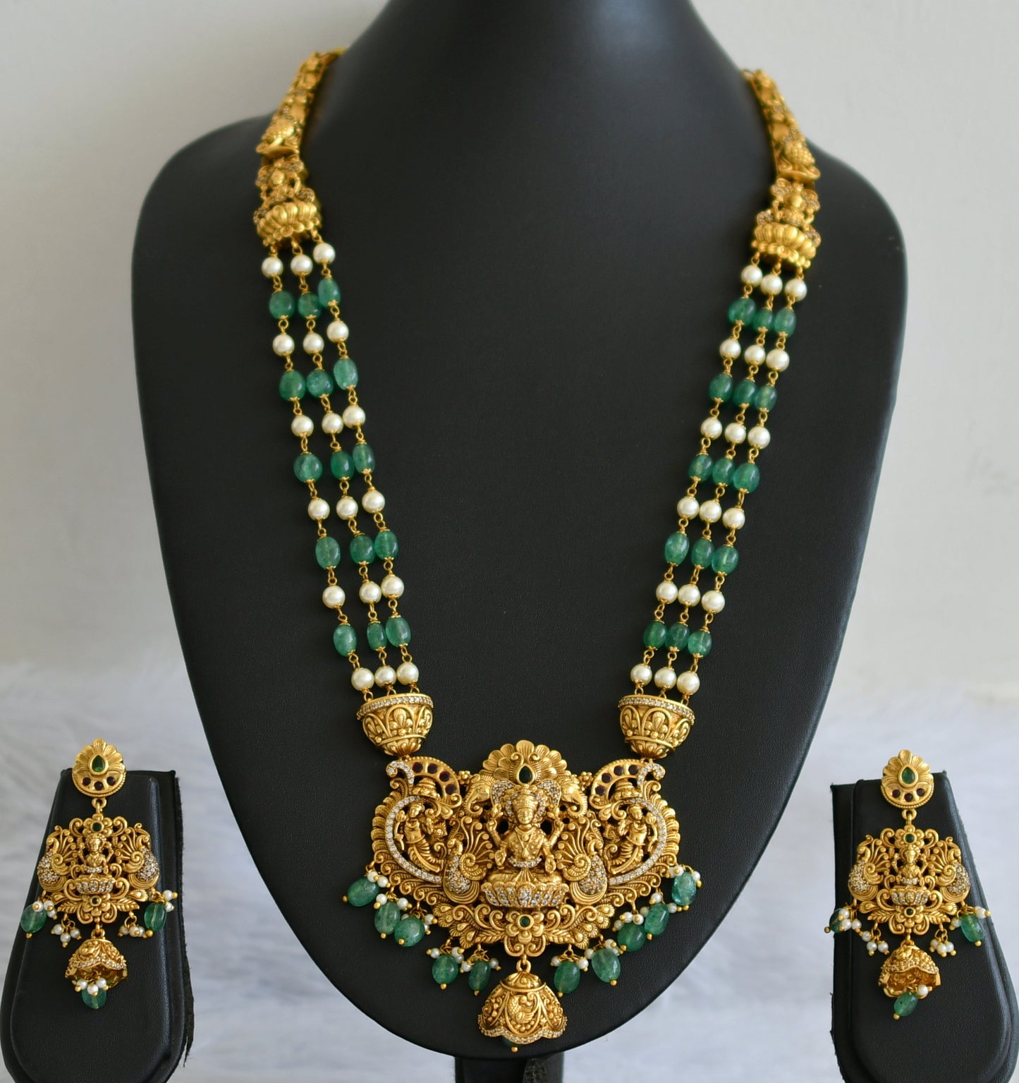 Antique gold tone kemp-green-white pearl-green beaded lakshmi peacock short haar set dj-50893